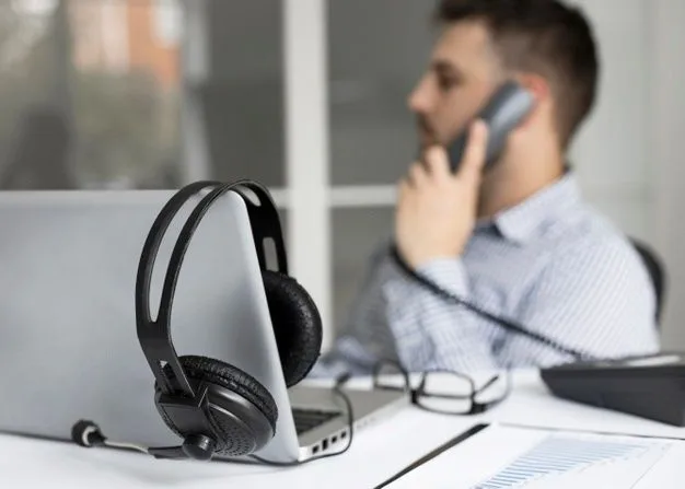 Customer support and analytics workspace with headset